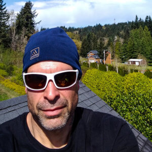 Thimble Insurance customer Reis Taylor on roof for contractors and handyman insurance