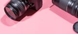 Professional camera and lens on pink backdrop for Thimble customer spotlight - Alex Gasaway