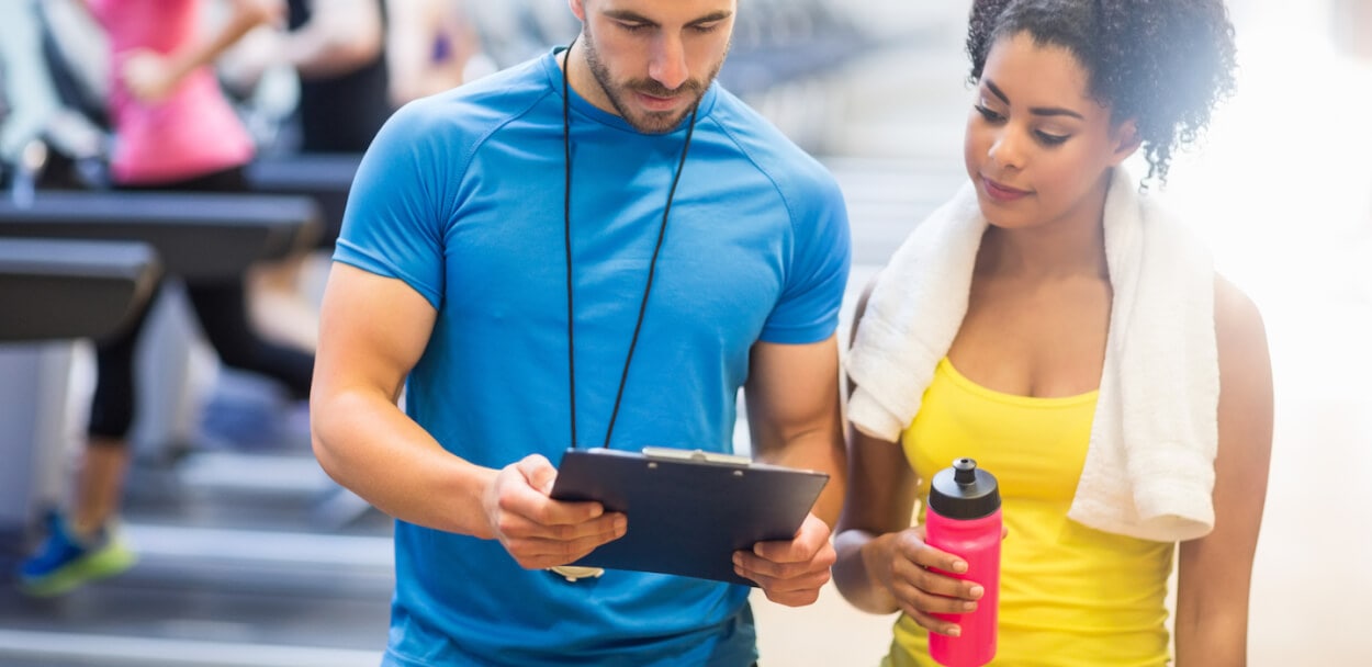 personal trainer with client