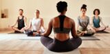 yoga instructor and students