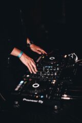 DJ working on his equipment